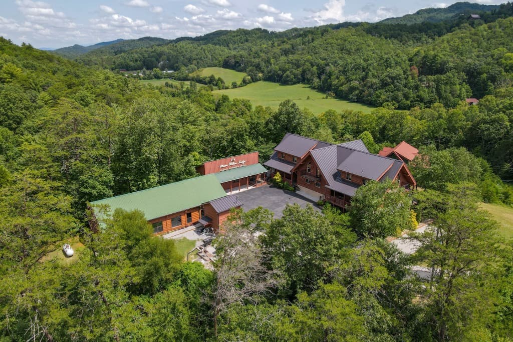 Aerial exterior of a log cabin lodge in the Smoky Mountains near Dollywood at Moose Hollow Lodge in Sevierville
